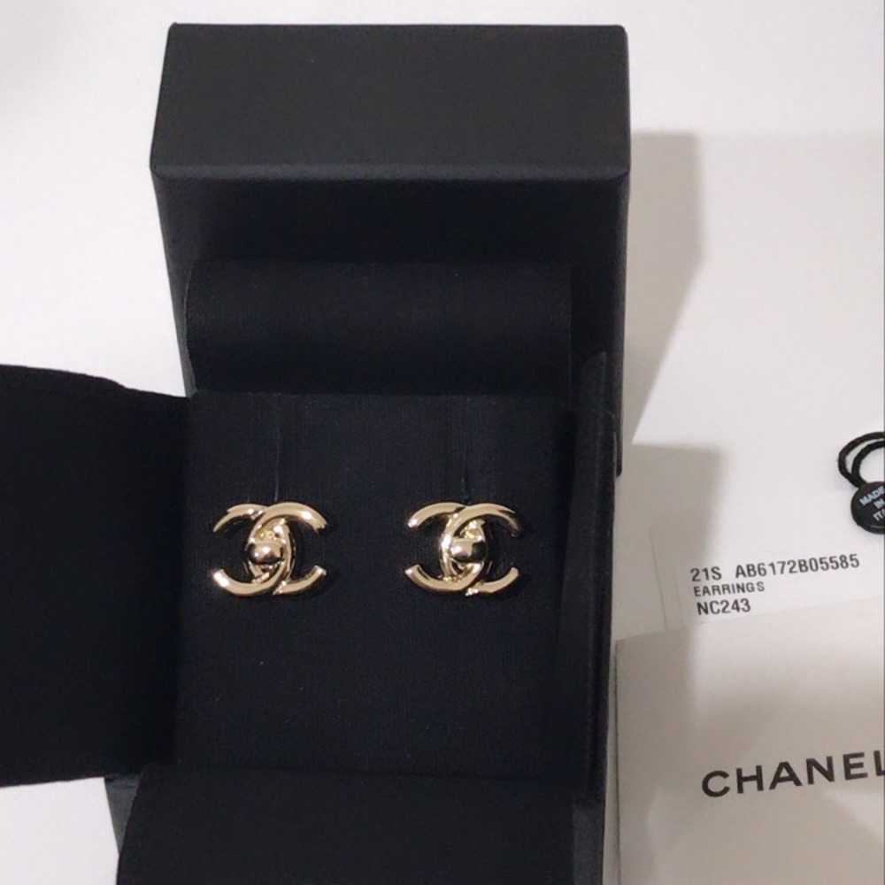 Chanel turn lock earrings